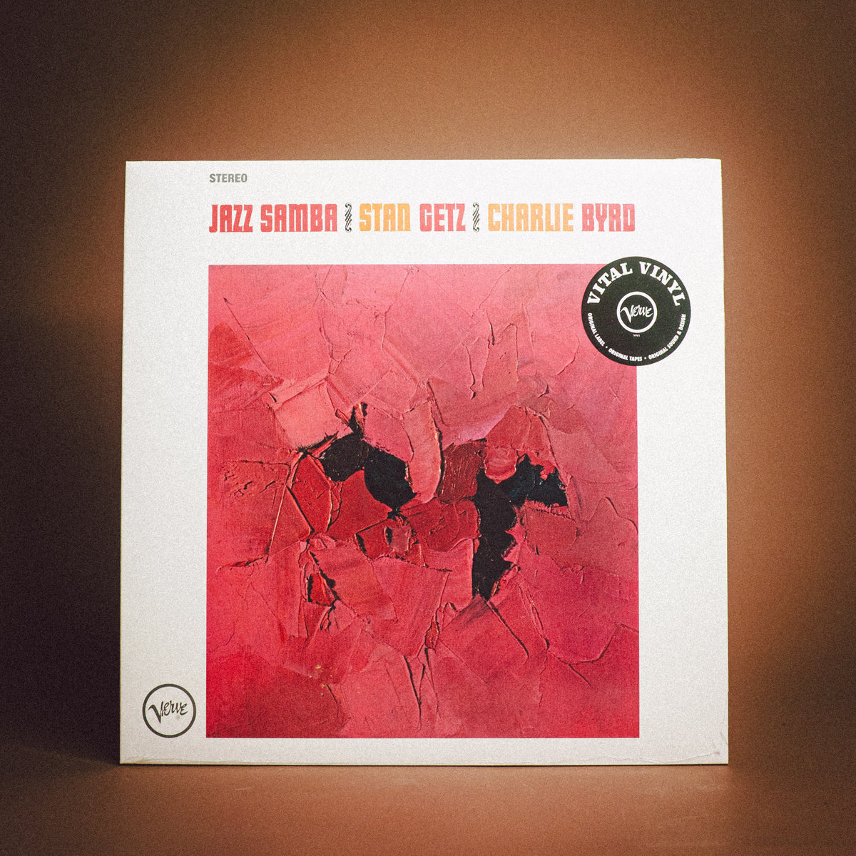 A vinyl record album cover for 'Jazz Samba' by Stan Getz and Charlie Byrd, featuring a textured red abstract painting on a white background with a black Vital Vinyl sticker.