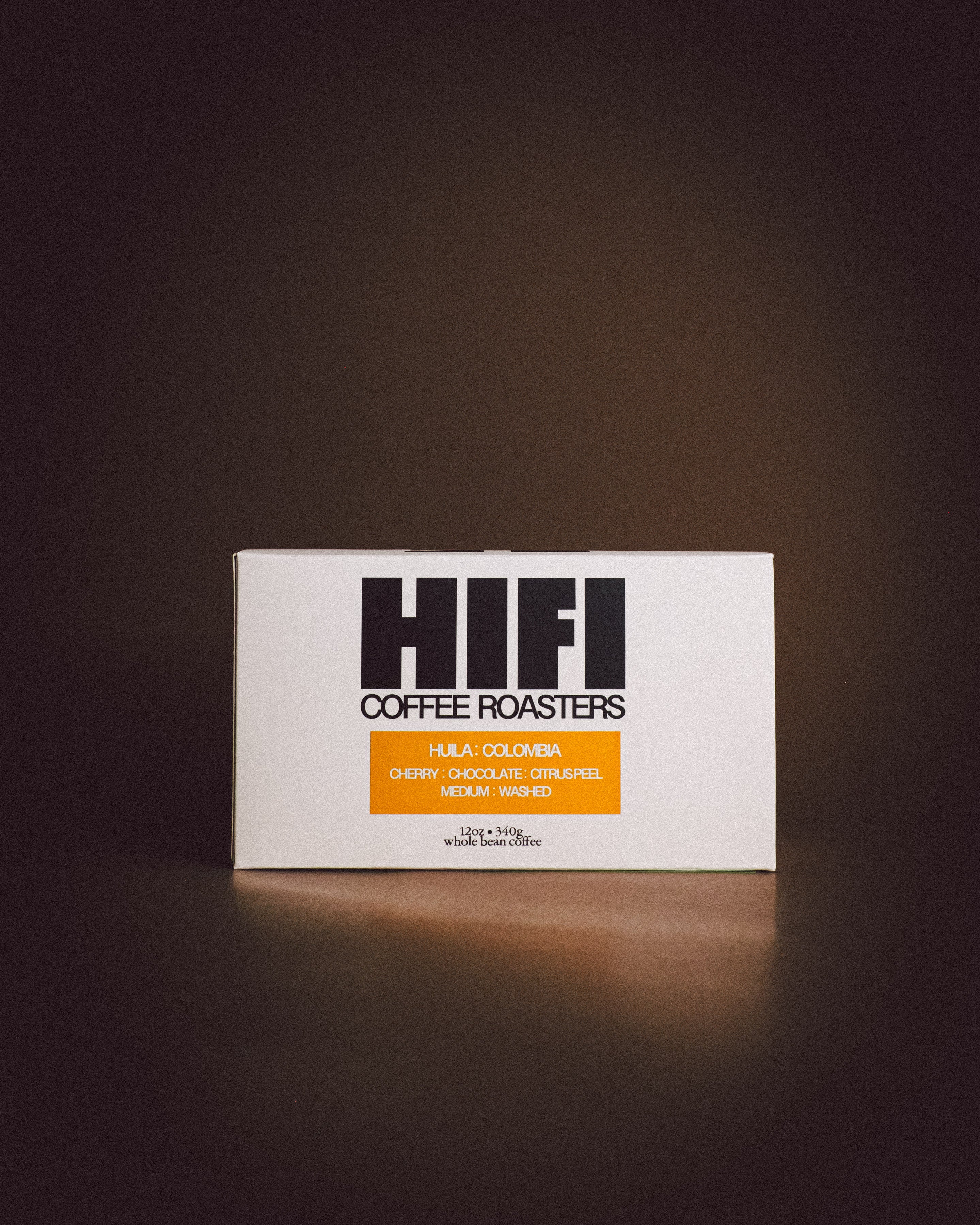 HI FI Coffee Roasters packaging on a dark background