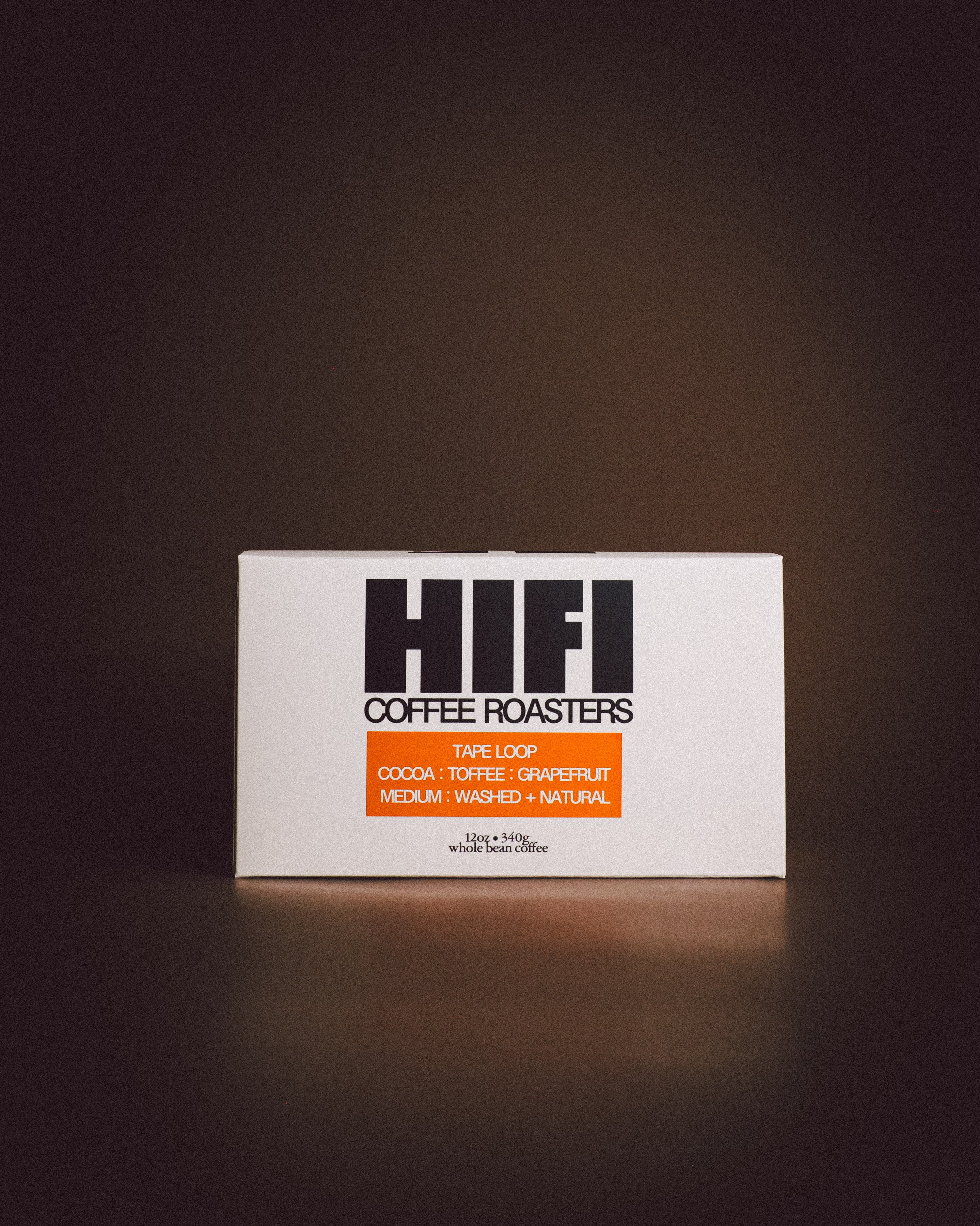 HI FI Coffee Roasters packaging on a dark background